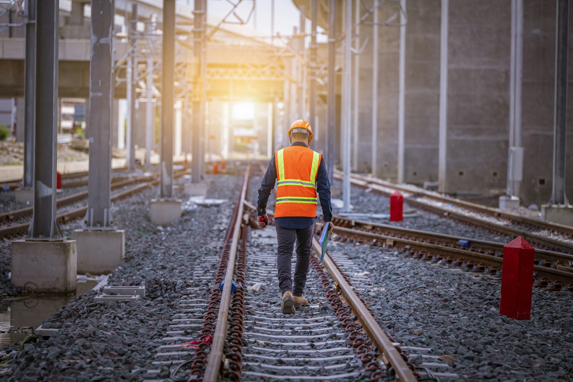 Engineer under discussion inspection and checking construction process railway switch and checking w